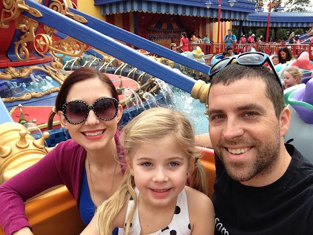 family on a ride at Disney