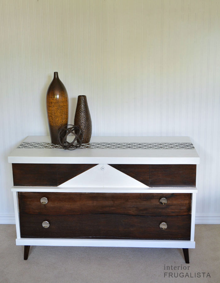 A mid-century modern cedar chest makeover idea with geometric paint and stain finish