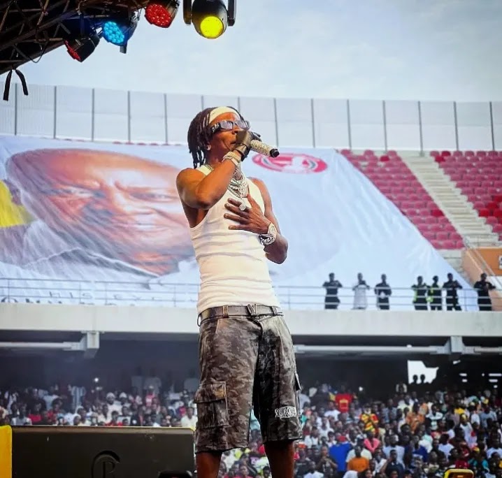 <"Shatta Wale performing at the Presidential FA Cup competition 2025".>
