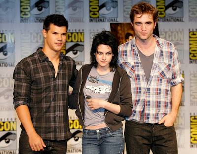 Taylor Lautner, left, Kristen Stewart, center, and Robert Pattinson