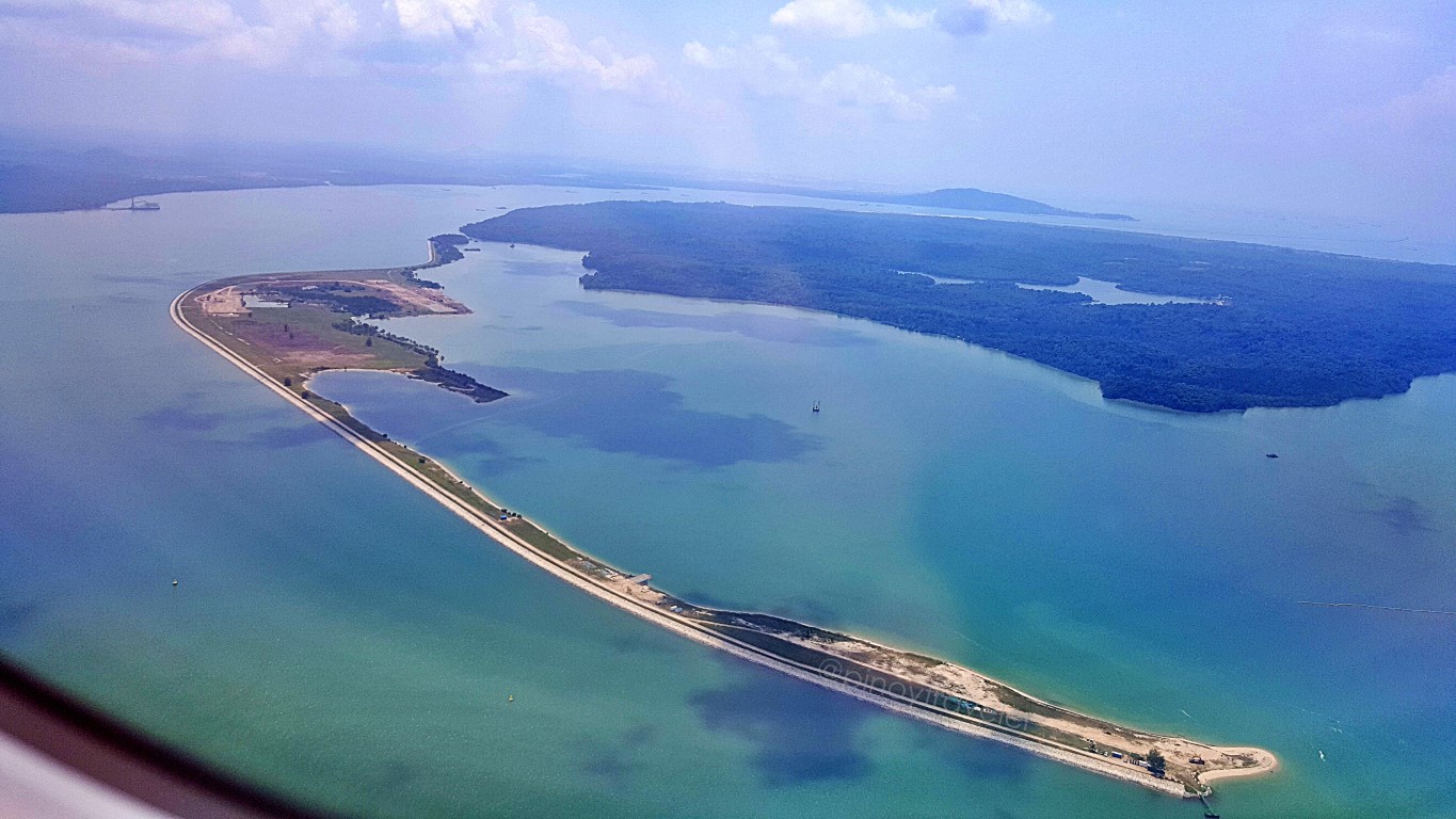 view of Pulao Tikong while landing into singapore's changi Airport Runway 20R