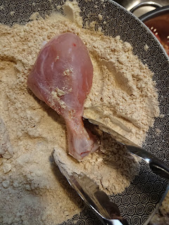 Dredging Chicken in gluten free flour & spice mixture