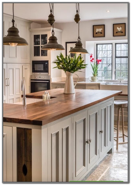 antique white kitchen cabinets with butcher block countertops