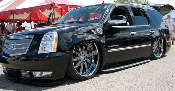 Ekstensive out of Texas showing off a bagged Cadillac Escalade on 26 Asanti