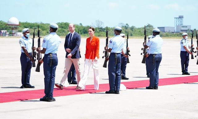 Kate Middleton, Duchess of Cambridge wore her YSL Saint Laurent red jacket, and white trousers. The Duke and Duchess in Jamaica