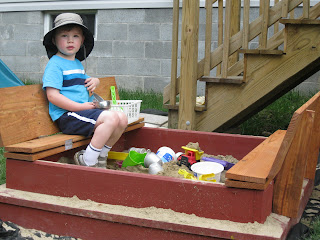 sandbox lid folds and turns into a bench