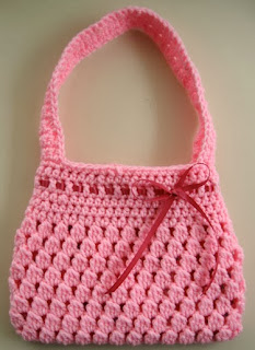 http://translate.googleusercontent.com/translate_c?depth=1&hl=es&rurl=translate.google.es&sl=en&tl=es&u=http://speckless.wordpress.com/2010/11/19/free-crochet-pattern-bobble-licious-bag/&usg=ALkJrhjPr5vuJQiUXYFpt6FdrB2SSpYqng