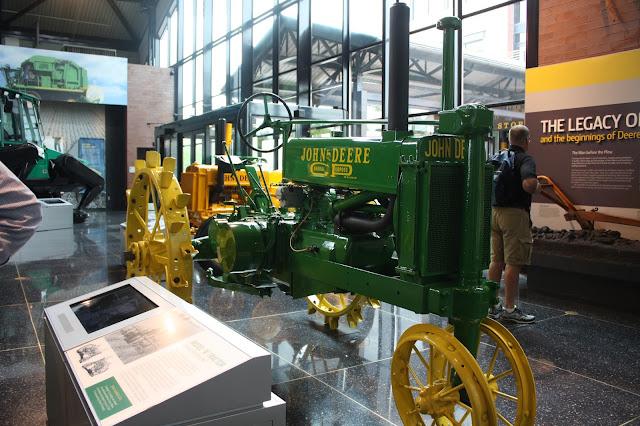 An early John Deere tractor at the John Deere Pavilion