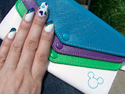 I got this cute wristlet for my sister Ashley and decided to use it as . (disney nails )