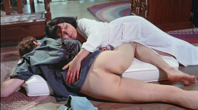 Michael Gaunt and Tara Chung in a scene from A WOMAN'S TORMENT