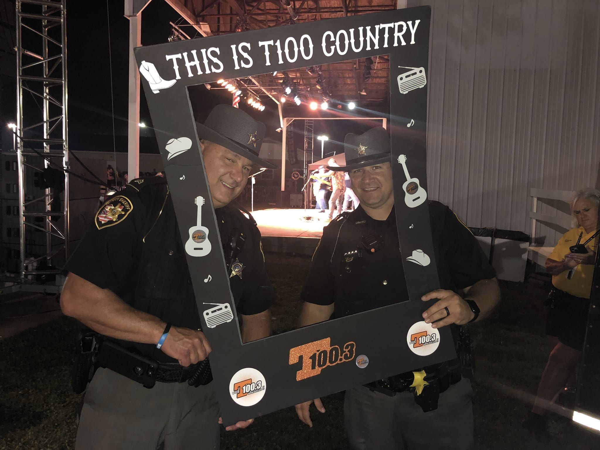 sheriffs with a country sign