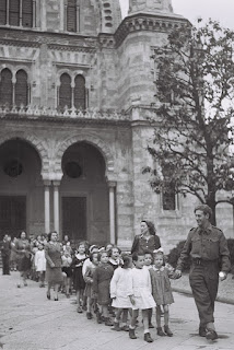 A Jewish Brigade Soldier and Nurses of the Jewish Agency Taking Care of Jewish Refugee Children in Florence, Italy, 1944