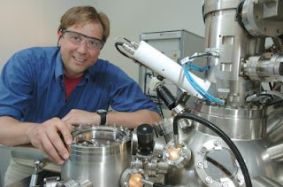 Caption: Matthias Bode, Center for Nanoscale Materials, is shown with his enhanced spin polarized scanning tunneling microscope (SP-STM). His enhanced technique allows scientists to observe the magnetism of single atoms. Use of this method could lead to better magnetic storage devices for computers and other electronics. Credit: DOE/Argonne National Laboratory. Usage Restrictions: None.