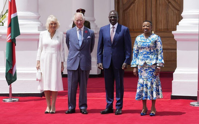 Queen Camilla wore a white dress and diamond brooch. President William Ruto and First Lady Rachel Ruto