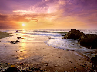 Foto met ondergaande zon op strand