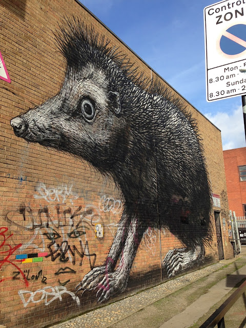 London Shoreditch city walk Belgian street artist ROA  The Squid Stories 