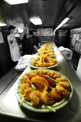 Preparing gourmet meal in the galley