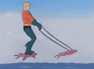 Aquaman using fish as transportation