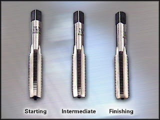 taps used in making hole with its threads in fitting shop