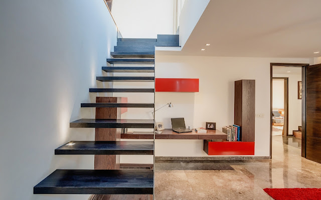 Picture of black modern wooden staircase without the railing