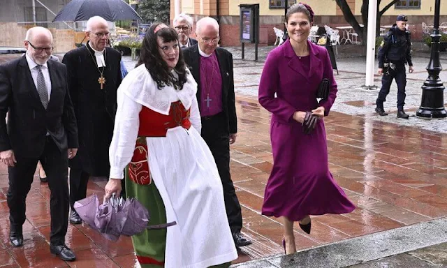 Crown Princess Victoria wore a wine red midi dress by Camilla Thulin, and a red jacket by Andiata
