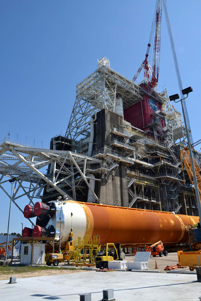 The SLS core stage booster is placed in horizontal position after being removed from the B-2 Test Stand at NASA's Stennis Space Center in Bay St. Louis, Mississippi...on April 20, 2021.