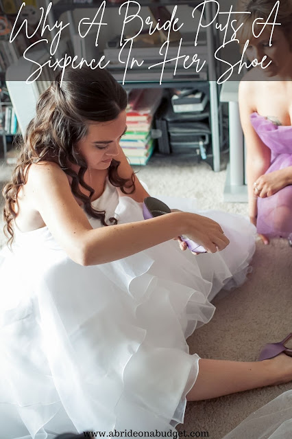 Have you ever wondered WHY a bride puts a sixpence in her shoe? Find out the reason from www.abrideonabudget.com.