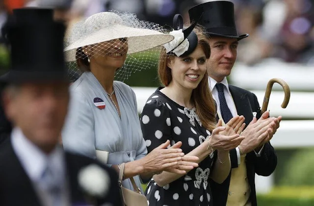 Princess Beatrice wore a Jaime crystal-bow polka-dot silk-crepe midi dress by Saloni, and her Jimmy Choo Romy pumps