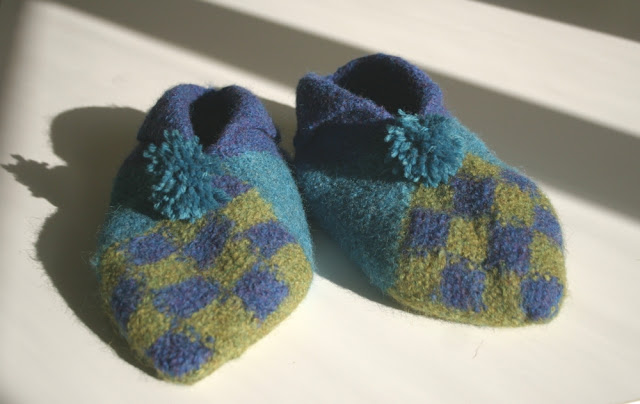 Finished Norwegian Slippers with a pom-pom.