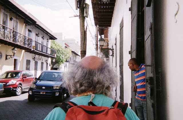 bald tourist downtown