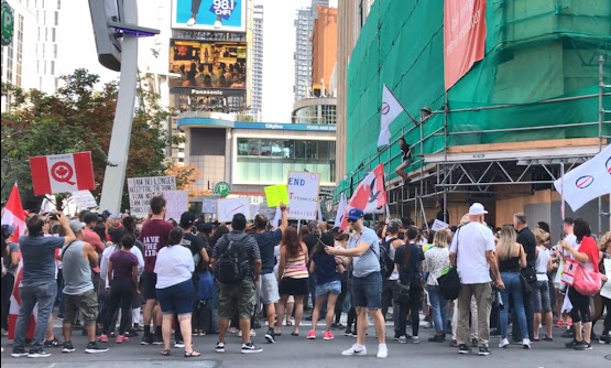 Toronto protest lockdown pandemic COVID-19 politics healthcare