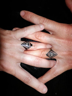 matching ring finger tattoos