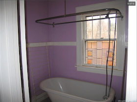 lavendar bathroom  in yellow house for sale at 70 Crescent Street, Winsted, CT