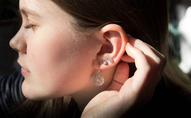 girl with ear piercings