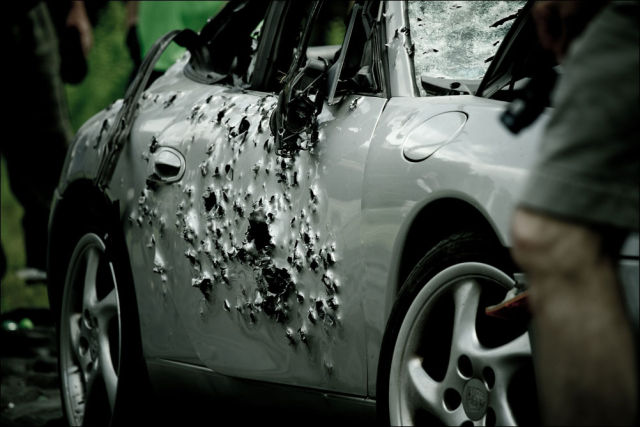 Porsche 911 Gets Shot up with Weapons