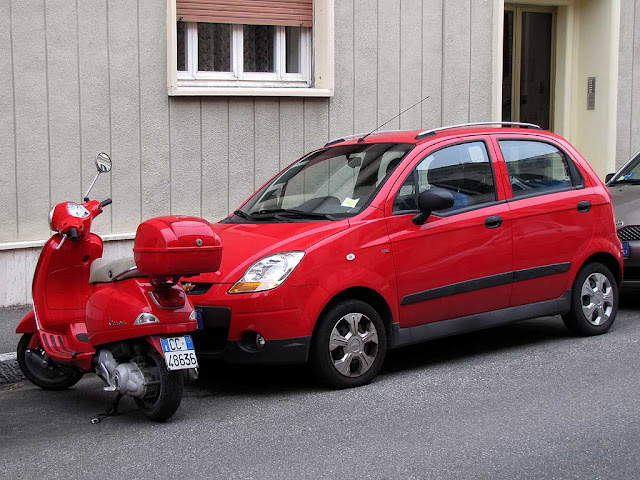 Red car and scooter, Livorno