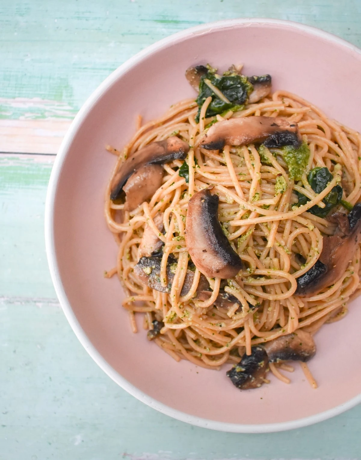 close up of mushroom pesto spaghetti