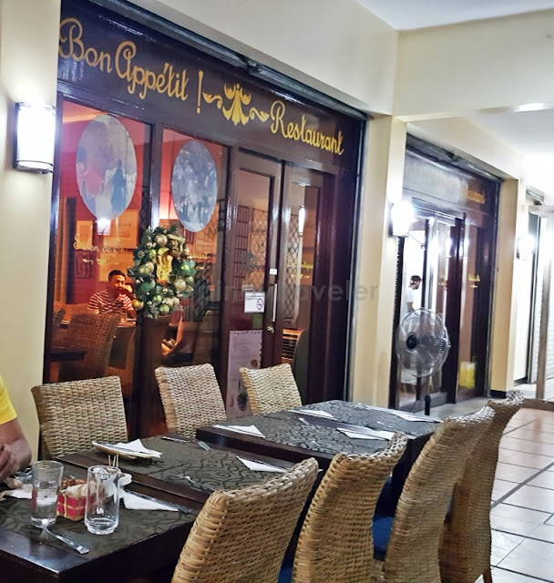 outside dining area with the main restaurant in the background of Bon Appetit French Restaurant in Davao City