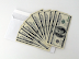 How does one get the benefits of compounding in mutual fund investments?