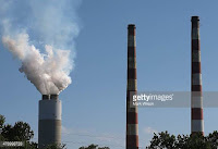 Emissions spew out of a large stack at the coalfired Morgantown Generating Station June 29 2015 (Credit: gettyimages.dk) Click to Enlarge.