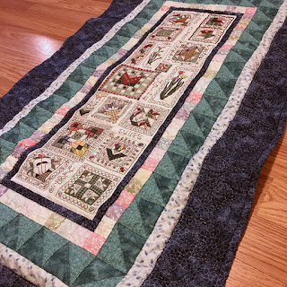 How to wash a quilt with cross stitch embroidery on linen