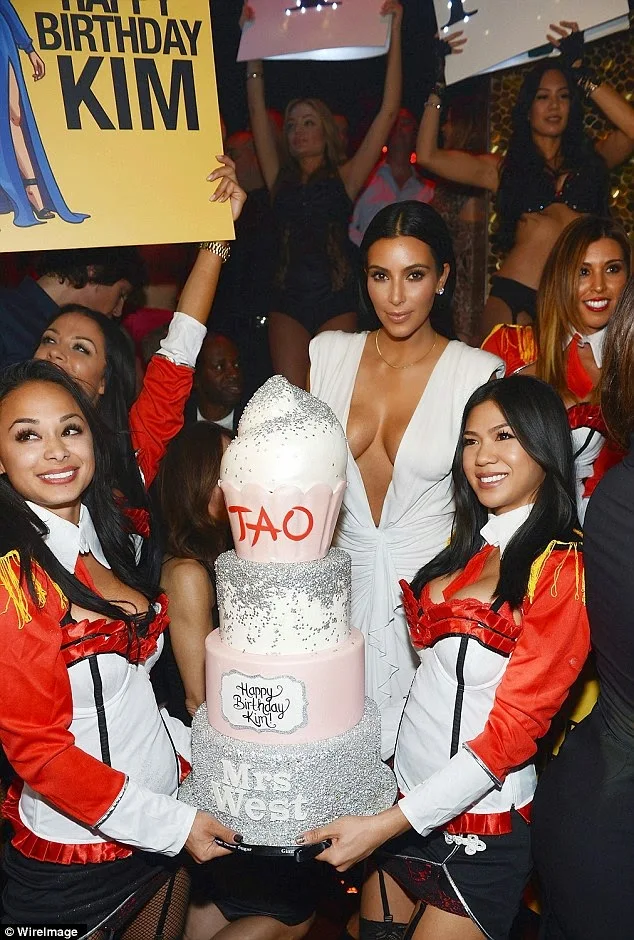 Kim Kardashian bares cleavage in a revealing dress for 34th birthday party in Las Vegas