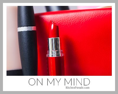 On My Mind ♥ KitchenParade.com. A red lipstick next to a red purse, symbolizing my mother's idea of good investments.