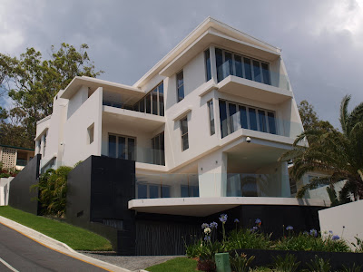 Modern-luxury-house-three-floors-white-color-and-large-windows