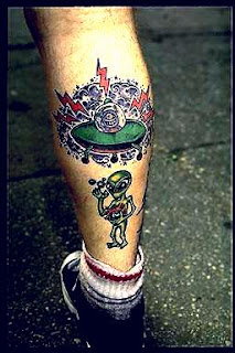 Alien Tattoo Design Picture gallery - Alien Tattoo Ideas