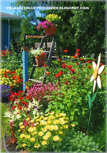 Planting in Terra Cotta Pots www.organizedclutterqueen.blogspot.com