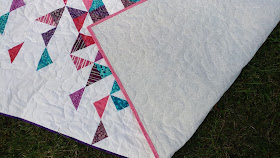 Heart quilt with quarter square triangles