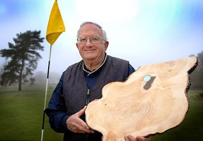 What a slice! Stray golf ball discovered buried inside felled tree Seen On www.coolpicturegallery.net