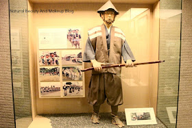 Models wearing fisherman clothes at Macau Maritime Museum, Barra square, China, Macau
