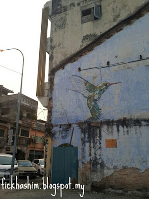 hummingbird mural by ernest zacharevic in ipoh